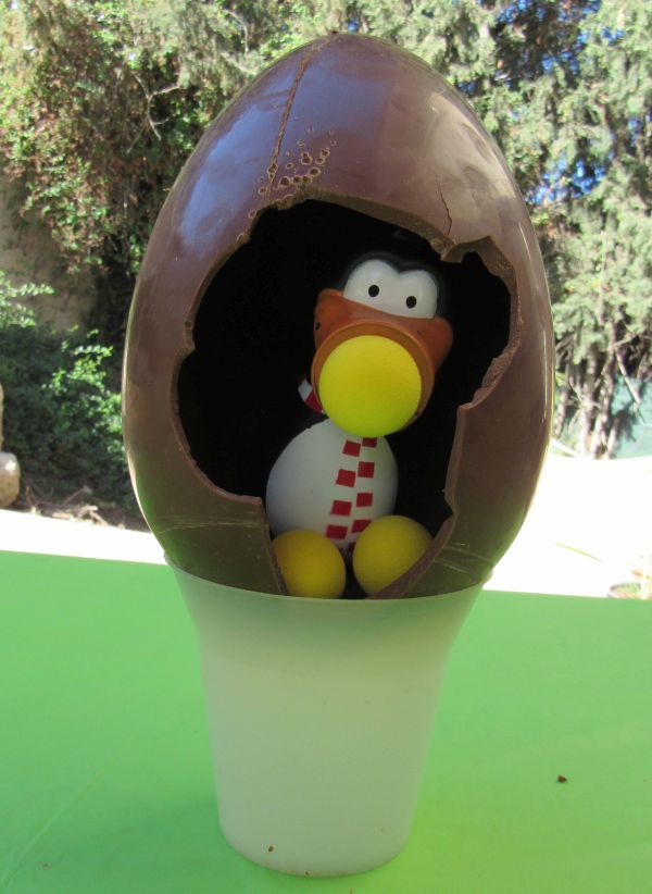 toy penguin air gun inside chocolate egg